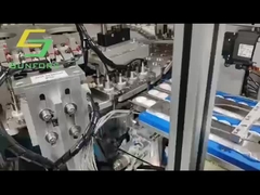 Machine d'assemblage de capuchon d'héli