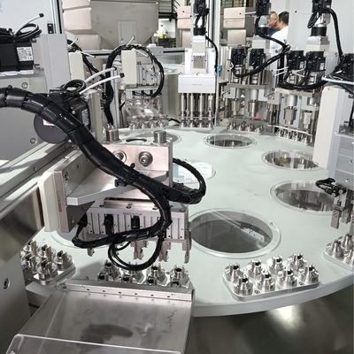 Machine de remplissage automatique non standard de type ressort à capuche séchante avec une haute précision de remplissage et un taux de passage élevé